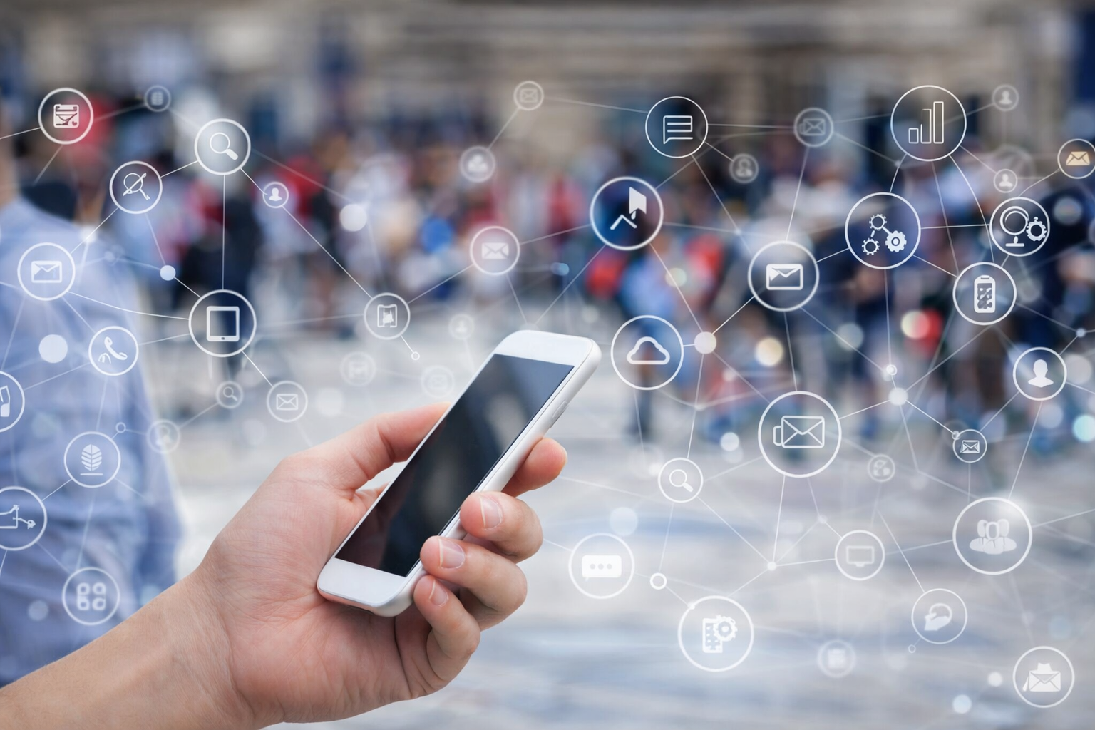 スマートフォンを持つ手とネットワークアイコンの背景画像